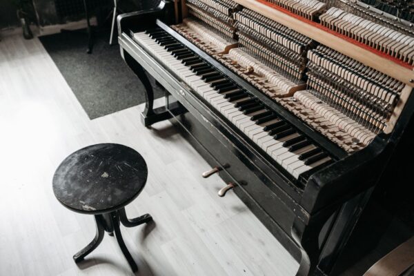 Internal action and keys of an upright piano showing its delicate mechanical parts